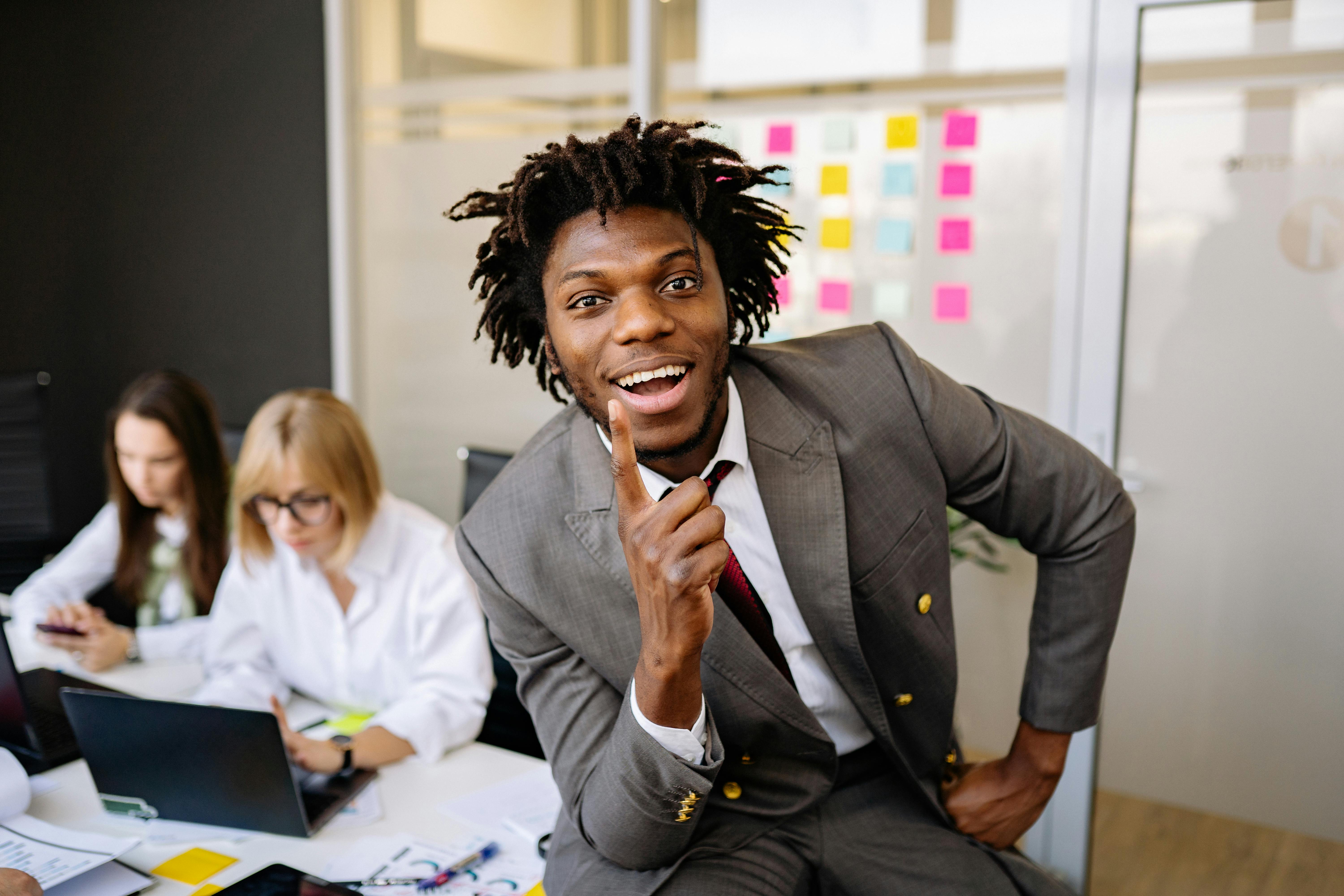 Photo by Yan Krukau: https://www.pexels.com/photo/a-man-with-dreadlocks-wearing-a-suit-7793169/